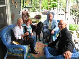 Lily Dale, NY (G) A group of believers in Spiritualism on the porch of the coffee shop in Lily Dale.