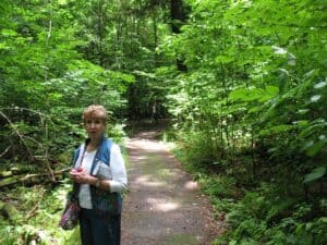 Lily Dale, NY (O) Adele Bowen in the forest at Lily Dale