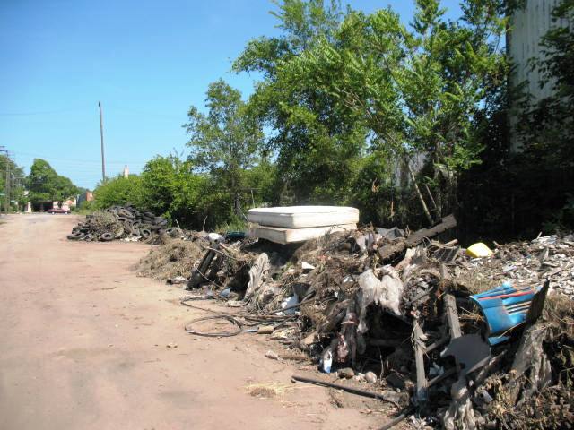Piles of debris cleared from vacant lots in Detroit