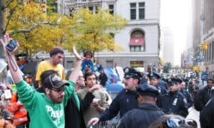 The cops confront the Occupy Wall Street protestors.