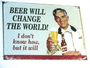 Beer Will Change the World sign at Big Al's Brewery in Seattle.