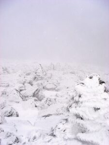 Snow covered cairns on Mt. Washington