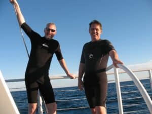 Malcolm Logan and Tim Lincoln aboard a catamaran off Key West