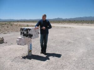 Malcolm Logan at the black mailbox near Area 51