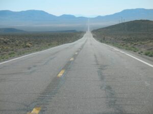 A long stretch of open road in the Nevada desert