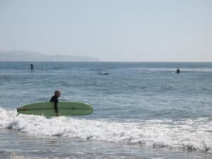 Surfers at Campus Point in Santa Barbara, CA
