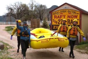 Carrying the raft to the river at Royal Gorge River Rafting