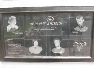 Plaque honoring the dead and injured outside the Youth with a Mission Training Center in Arvada, CO