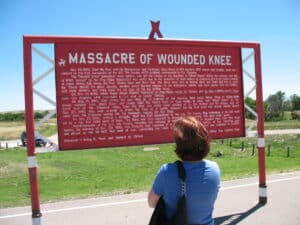 Explanatory sign at Wounded Knee massacre site