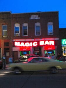 A GTO powers past the Magic Bar in Virginia, MN
