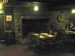 Fireplace and dining room at Jean Bonnet Tavern in Bedford, PA