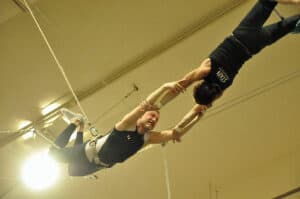 Malcolm Logan being caught by Kris of New York Trapeze School in Chicago