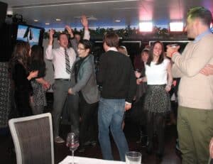 Dancing at the office Christmas party aboard the Mystic Blue in Chicago