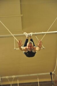 Malcolm Logan on the trapeze at New York Trapeze School in Chicago