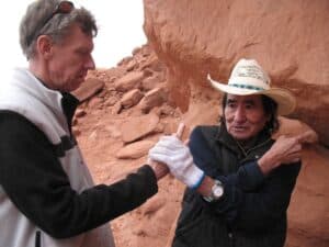 Don Mose explains the hand prints at Navajo Valley