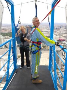 Malcolm Logan at the top of the Statosphere Tower preparing to jump.